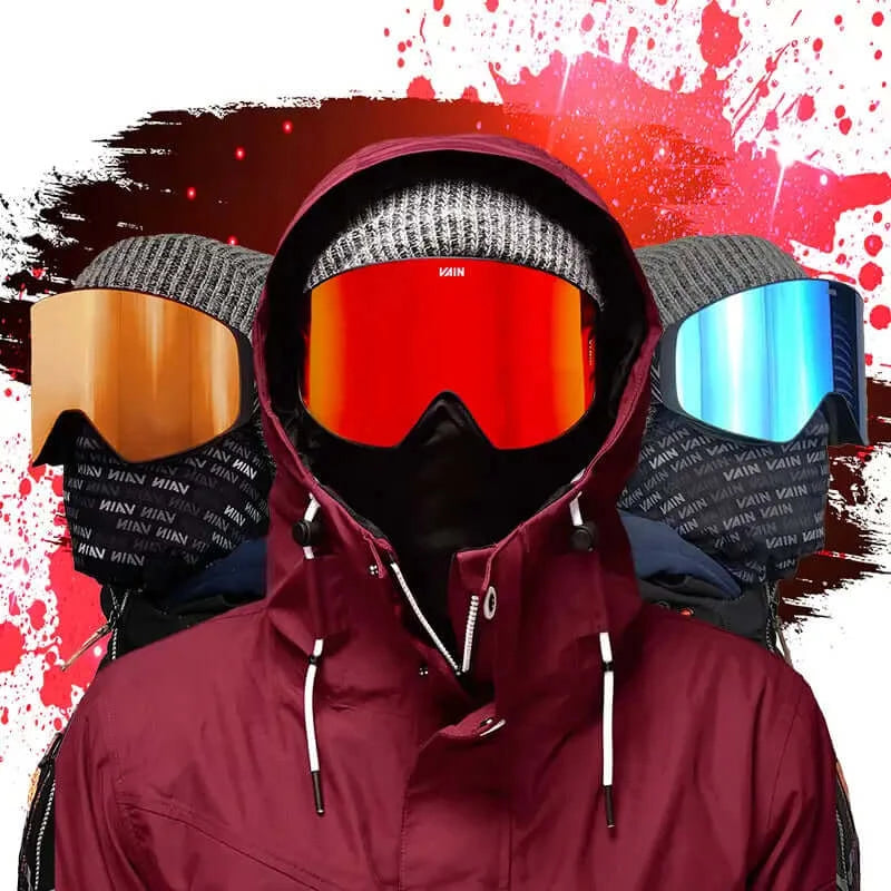 Image of three people with ski goggles on